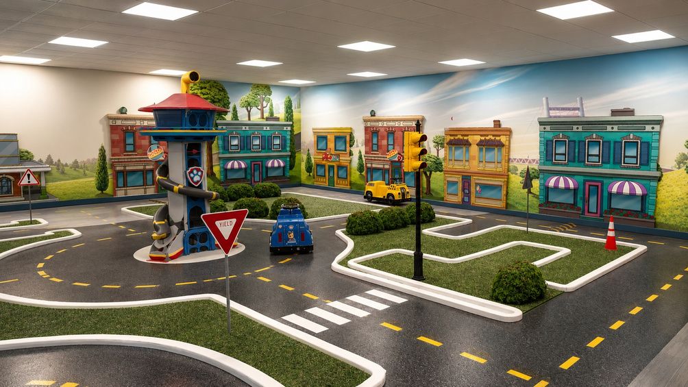 Indoor town circuit with lookout tower and road signs