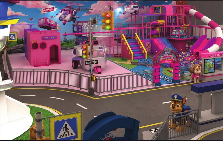 Pink aerial exploration hub with slides